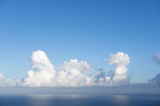 Cumulonimbus clouds above sea