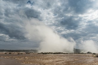 Cloud of water spray over Iguazu Falls