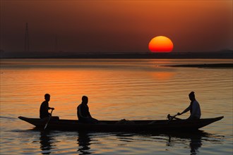 Boat at sunset on the Brahmaputra river