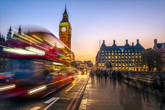 Red double decker bus in front of Big Ben