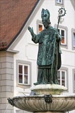 Statue of missionary and bishop Willibald on the Willibaldsbrunnen