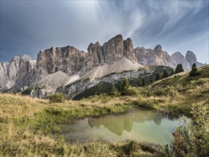 Sella Group with Piscadu reflected in a small pond
