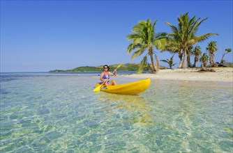 Woman in yellow kayak