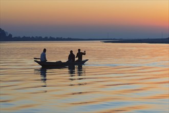 Boat at sunset on the Brahmaputra river