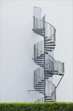 Spiral staircase on wall