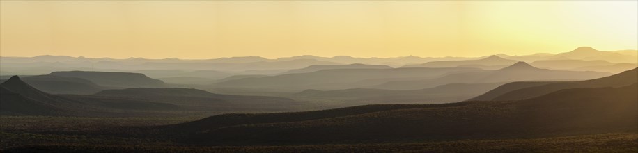 Staggered mountains in the sunset