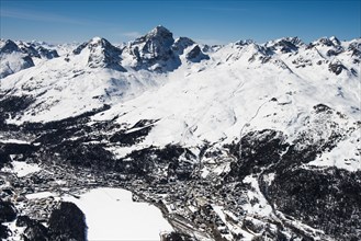 St.Moritz with St.Moritzsee in the winter mountains Piz Nair