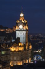 Balmoral Hotel tower illuminated in Edinburgh historic centre