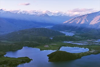 View of mountains and lake after sunset