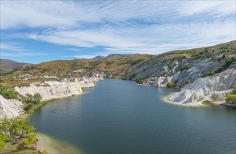 Lake surrounded by limestone cliffs