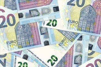 Heap of 20 euro bank notes background