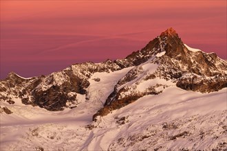Zinalrothorn with snow at dawn