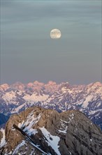 Santis Mountain overlooking Alpstein massif at full moon