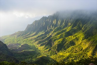 Napali coast with green mountains seen from the Kalalau lookout