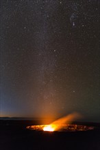 Milky Way above Halema'uma'u crater eruption