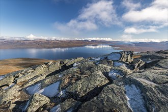 View from the top of the mountain Nuolja to the lake Tornetrask and the autumnal Fjell