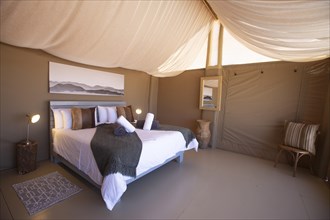 Double bed in luxury tent
