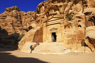 Hikers at rock-church in Little Petra