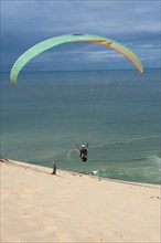 Paraglider on coast
