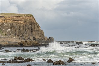 Cliffs and foaming waves