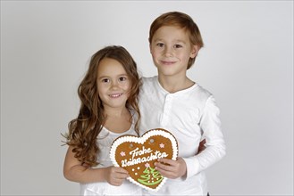 Children with a gingerbread heart
