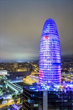 City view with illuminated Agbar Tower at night