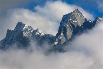Mountain peaks with clouds