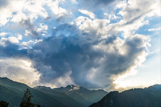 Dark clouds over Alpine panorama
