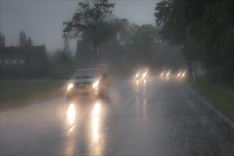Dangerous car drive in heavy rain