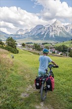 Cyclist on bike tour with mountain bike