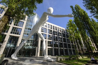 Walking Man sculpture by Jonathan Borofsky in front of insurance company Munich Re