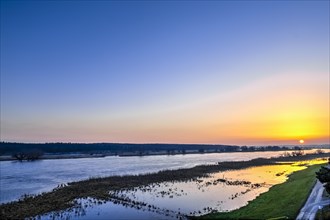 Sunset at the river Oder during flood