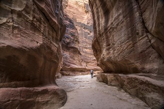 The narrow canyon Siq leads to Petra