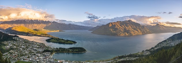 View of Lake Wakatipu and Queenstown at sunset