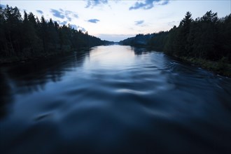 River in summer at midnight