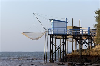 Traditional fishing huts built on stilts on the Gironde