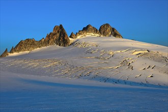 Morning sun at the glacier Plateau du Trento