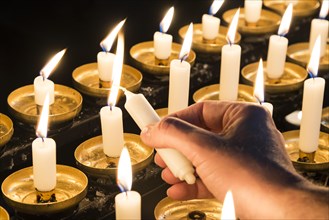 Lighted memorial candles