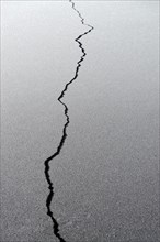 Crack in sheet of ice