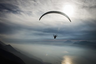 Paraglider over Lake Garda in Malcesine