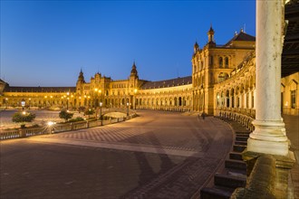 Illuminated Plaza de Espana at dusk