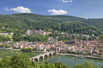 View of historic centre with Karl Theodor Bridge and castle from the Philosopher's Walk in Heidelberg