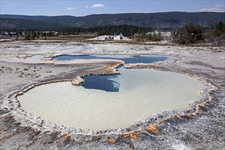 Doublet pool with mineral deposits