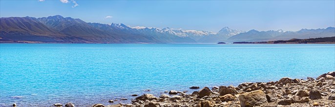 turquoise glacial Lake Pukaki with mountains