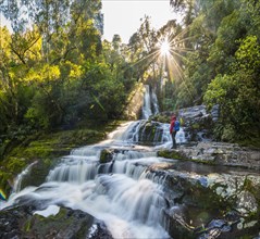 Hiker at McLean waterfall