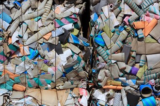 Waste paper for recycling in a recycling plant