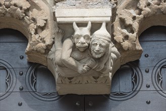 Devil relief on the portal