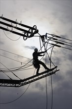 High-voltage engineer at work