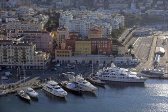 Town and luxury yachts in harbour