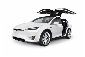 White 2017 Tesla Model X luxury SUV electric car with open falcon wing doors